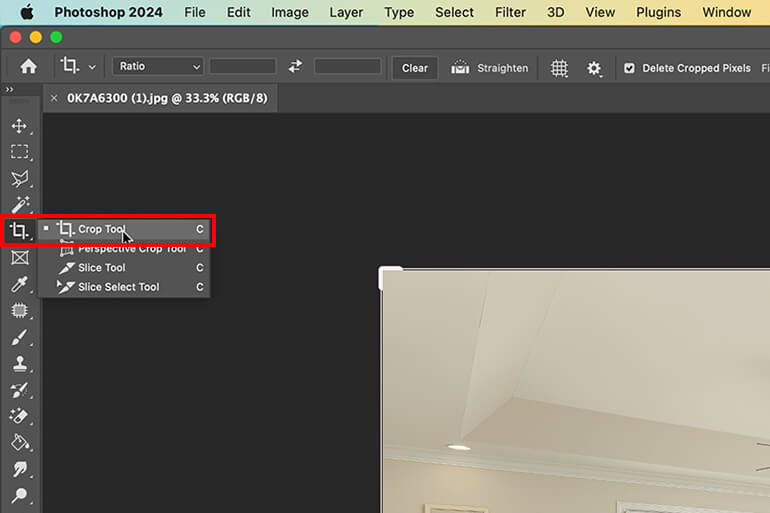 Seelect the Crop Tool in Photoshop