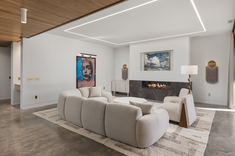 Side-by-side comparison of raw bracketed exposures and a fully edited luxury living room.