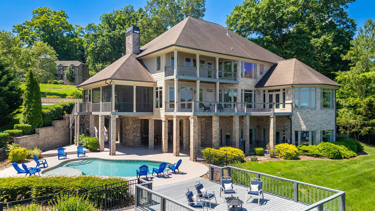 Luxury home exterior with a pool before and after professional real estate photo editing.