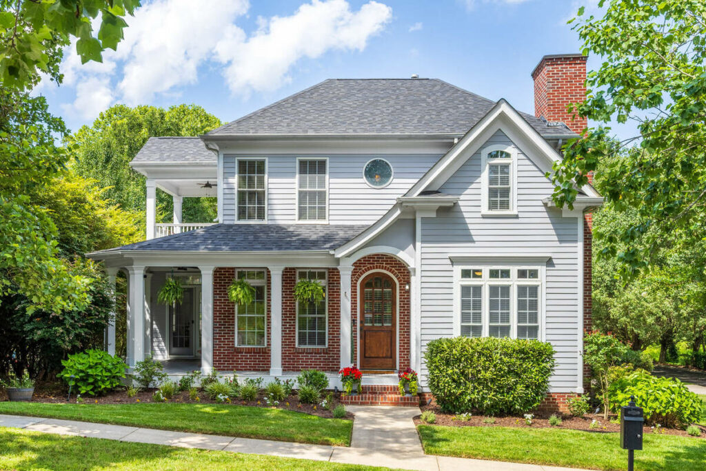 Professionally edited exterior photo of a modern home through photo editing outsourcing.