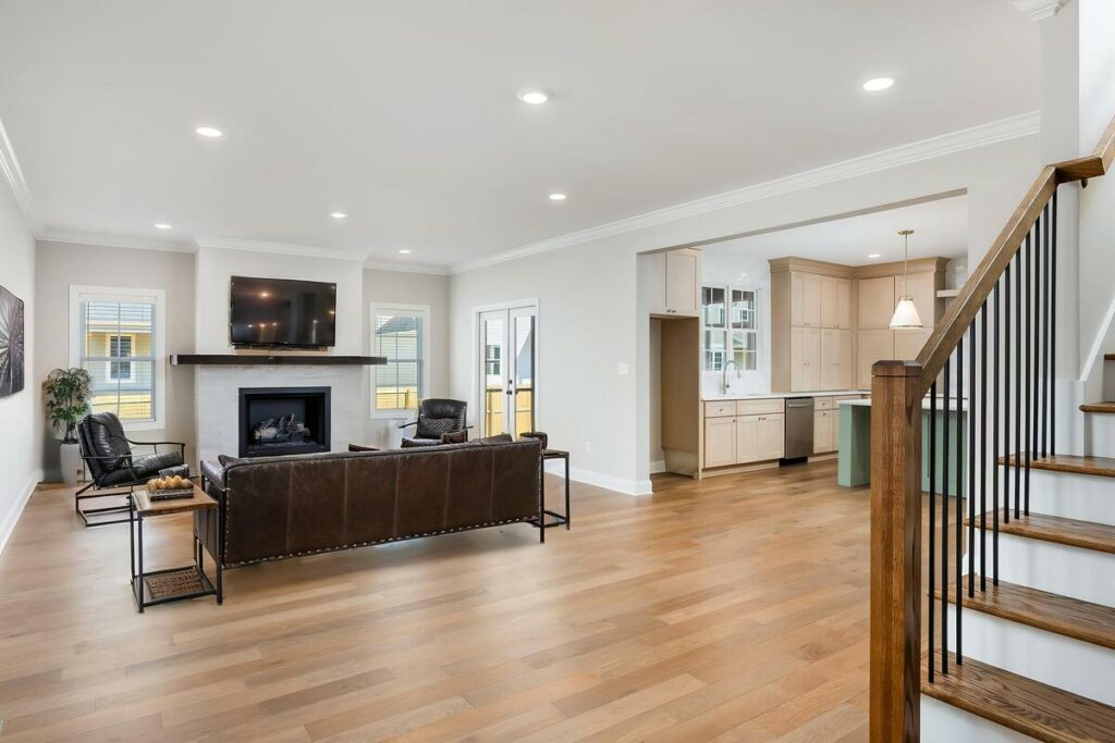 Open-concept living room transformed with virtual home staging services.