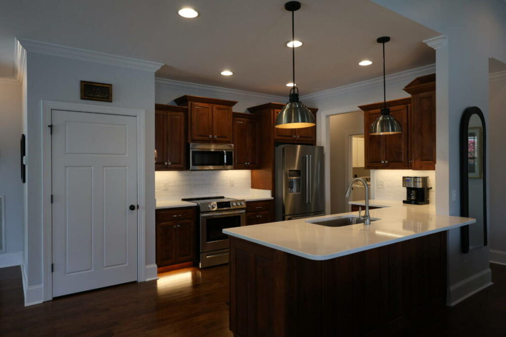 Dark kitchen before AI photo editing for real estate listing.