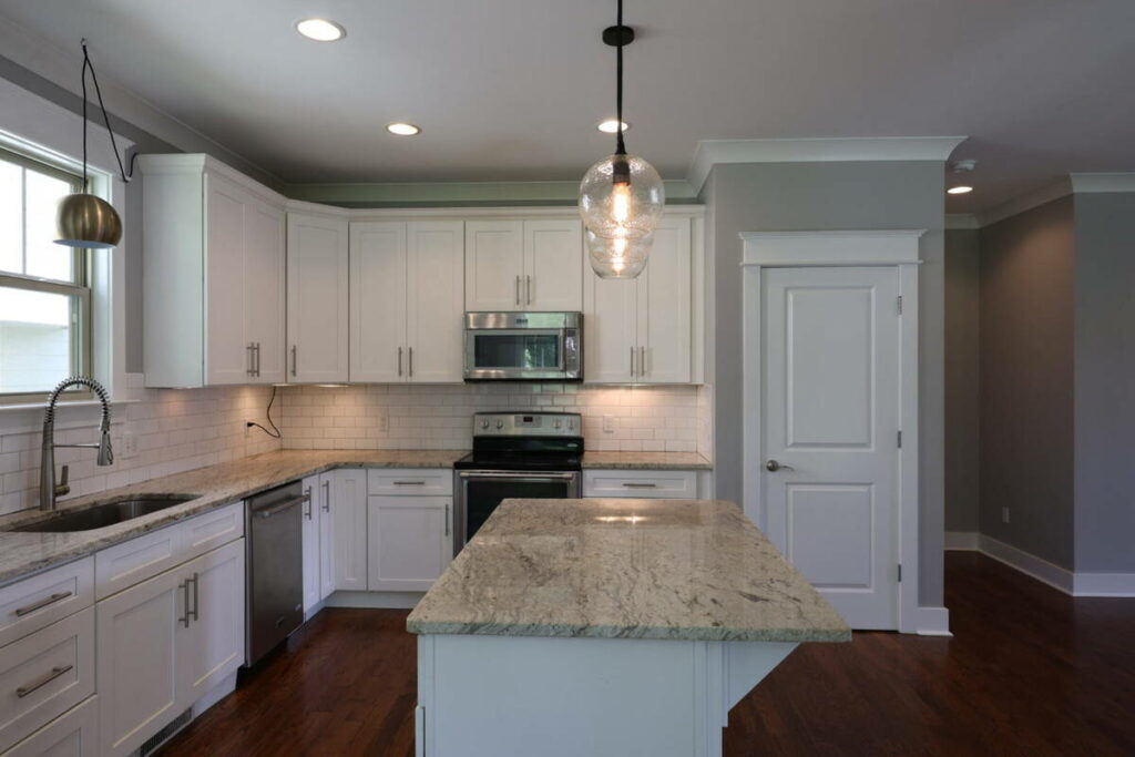 White kitchen before AI photo editing for real estate.
