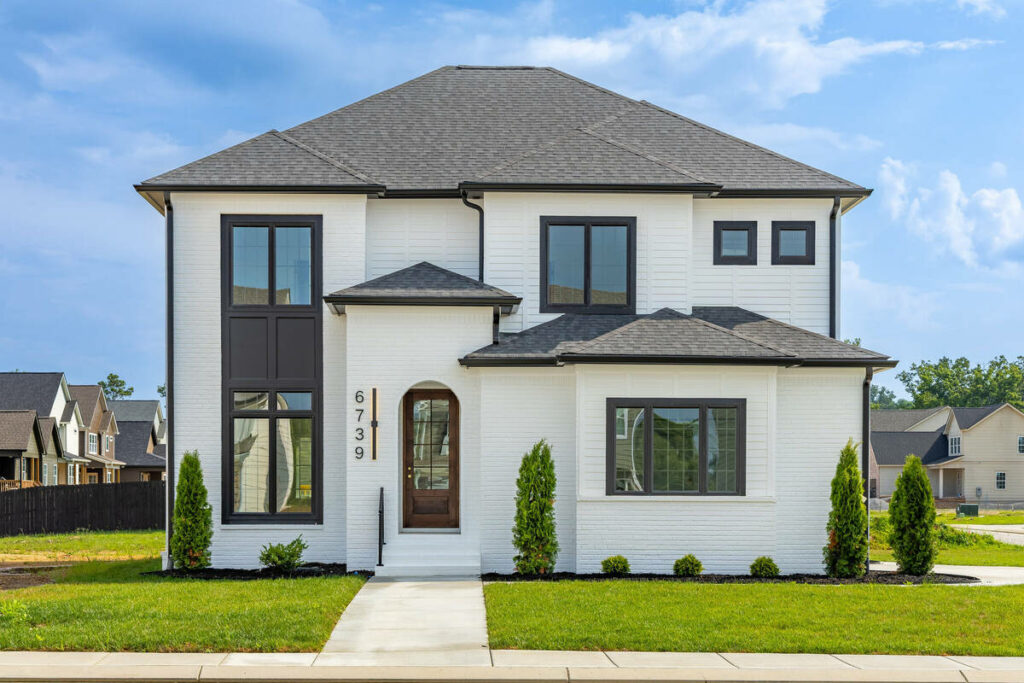 Home exterior after editing with the best AI for batch photo editing