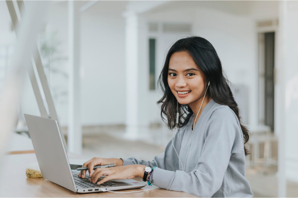 Remote coordinator assisting a real estate photography business in a virtual assistant vs employee workflow.