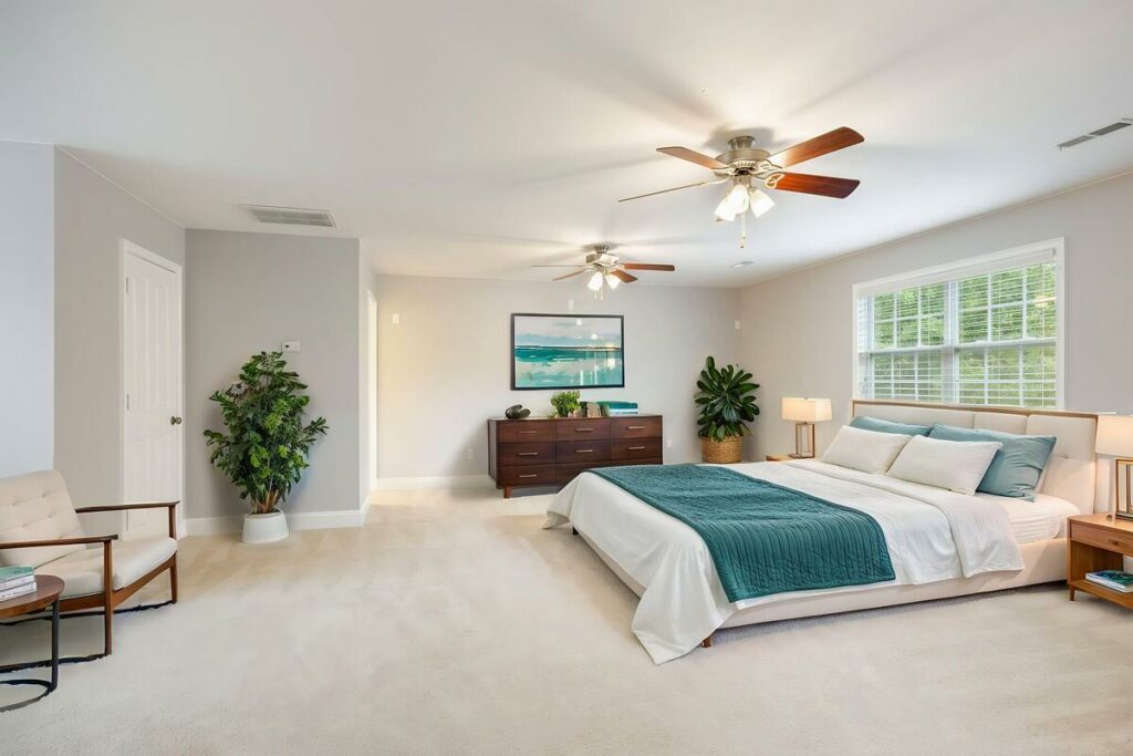 AI real estate photo editing with virtual staging transforming an empty bedroom into a furnished primary suite.