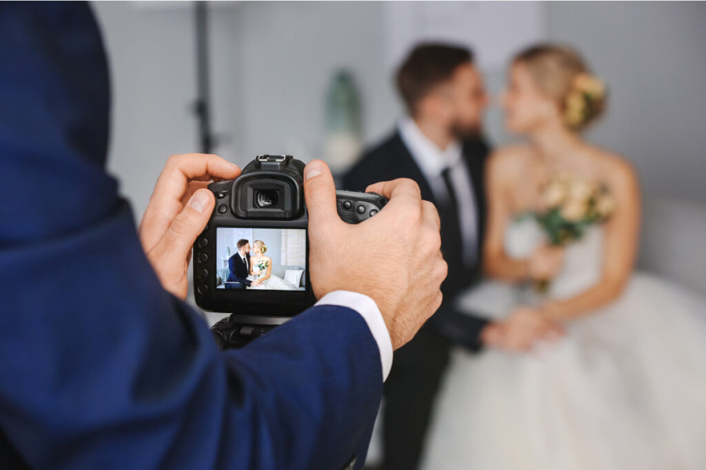Photographer reviewing images during wedding photo editing