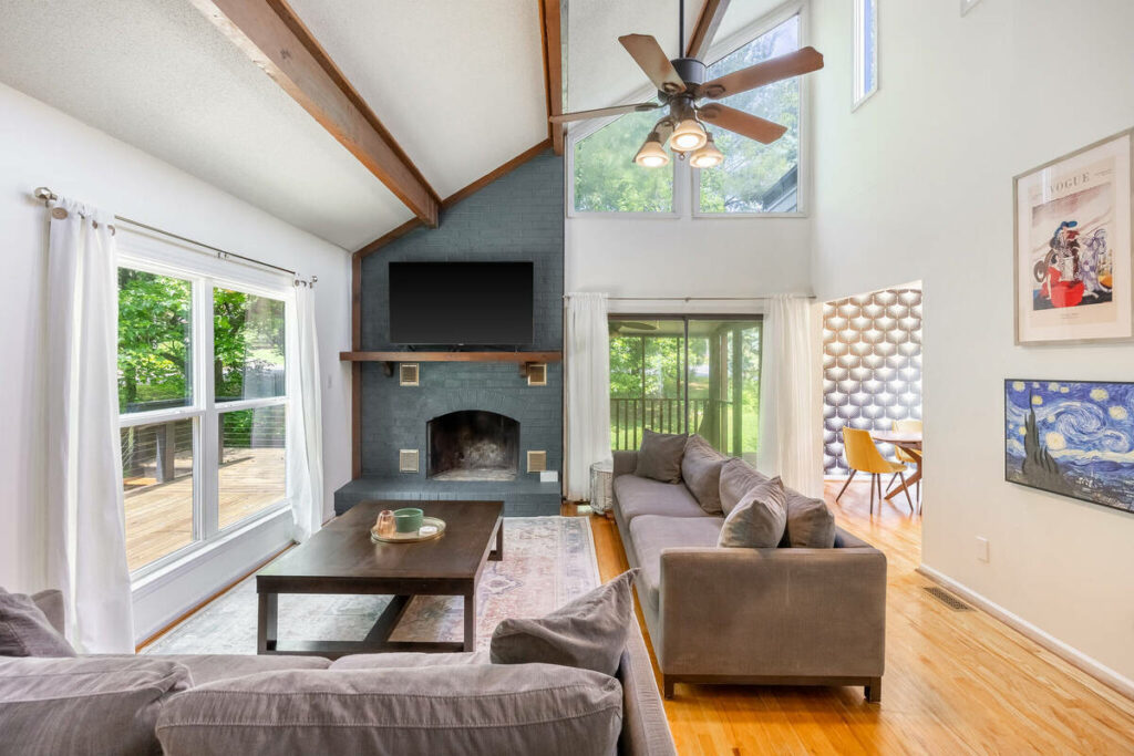 HDR real estate photo editing services for a bright vaulted living room interior