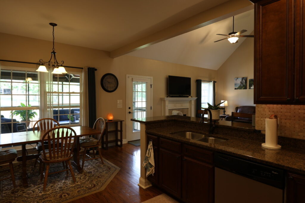 Dark kitchen and dining exposure before HDR real estate photo editing services