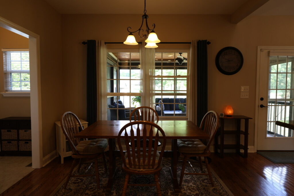 Dark dining room exposure before HDR real estate photo editing services