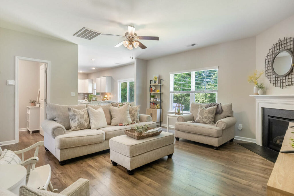 HDR real estate photo editing services for a bright living room with fireplace
