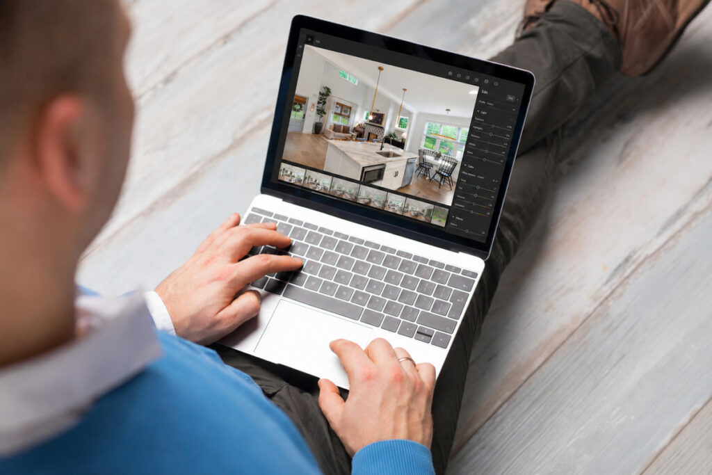 HDR real estate photo editing services shown on a laptop editing property photos