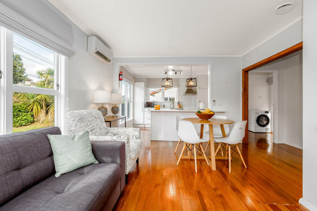 AI real estate photo editing for a bright living and dining room