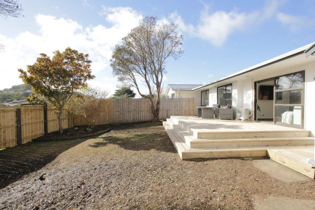 Backyard before AI real estate photo editing and lawn enhancement