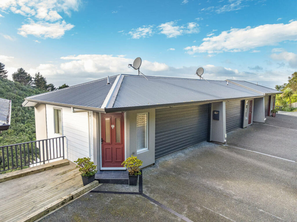 Home exterior after AI real estate photo editing and exposure correction