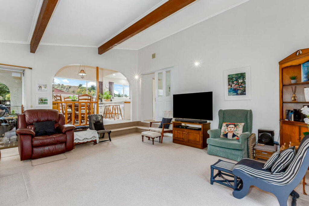AI real estate photo editing of a bright open-plan living room