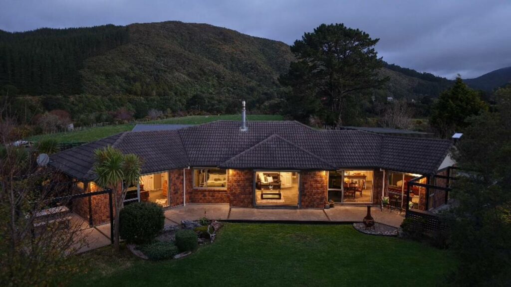 Aerial home exterior before AI real estate photo editing