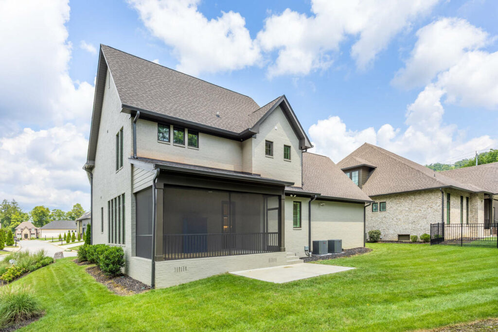 AI real estate photo editing of a modern rear home exterior