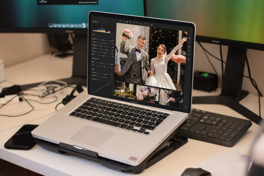 Wedding photo editing on a laptop with color and exposure controls