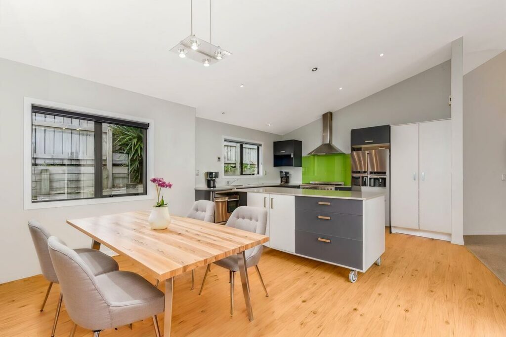 AI virtual staging of a modern dining area with a wooden table
