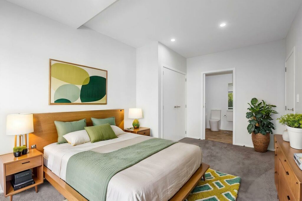 AI virtual staging of a modern bedroom with green accents