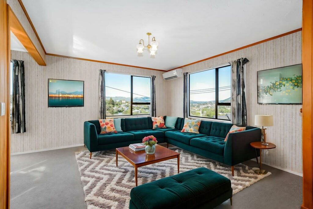 AI virtual staging of a modern living room with teal furniture