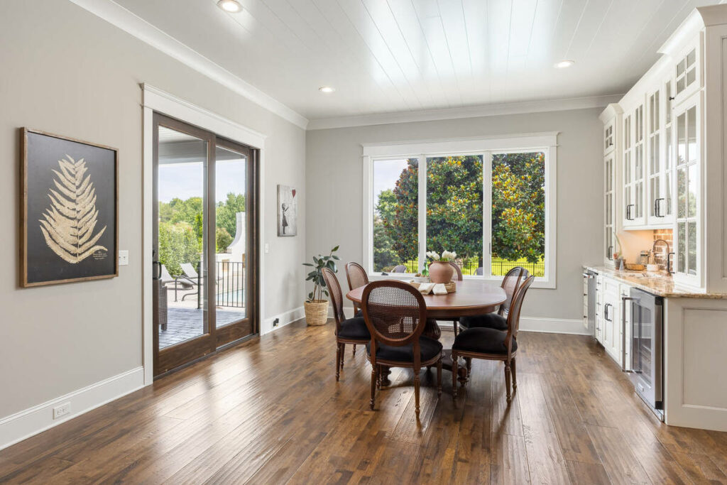 Professional photo editing with HDR blending for a bright dining room