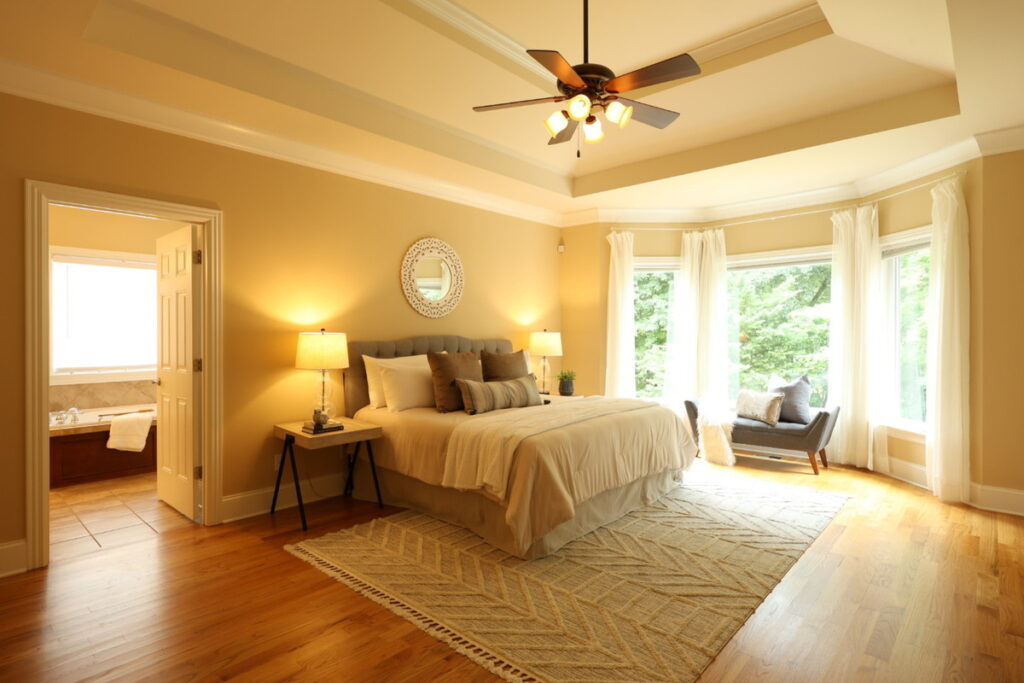 Bedroom with warm lighting before professional photo editing