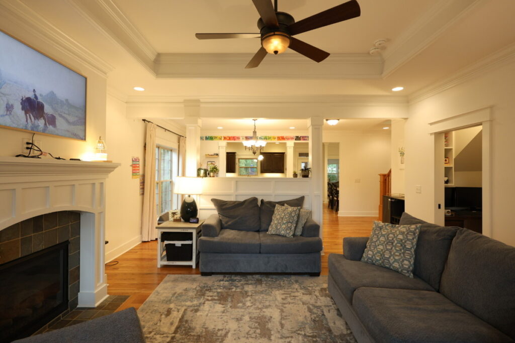 Living room with visible cords before professional photo editing
