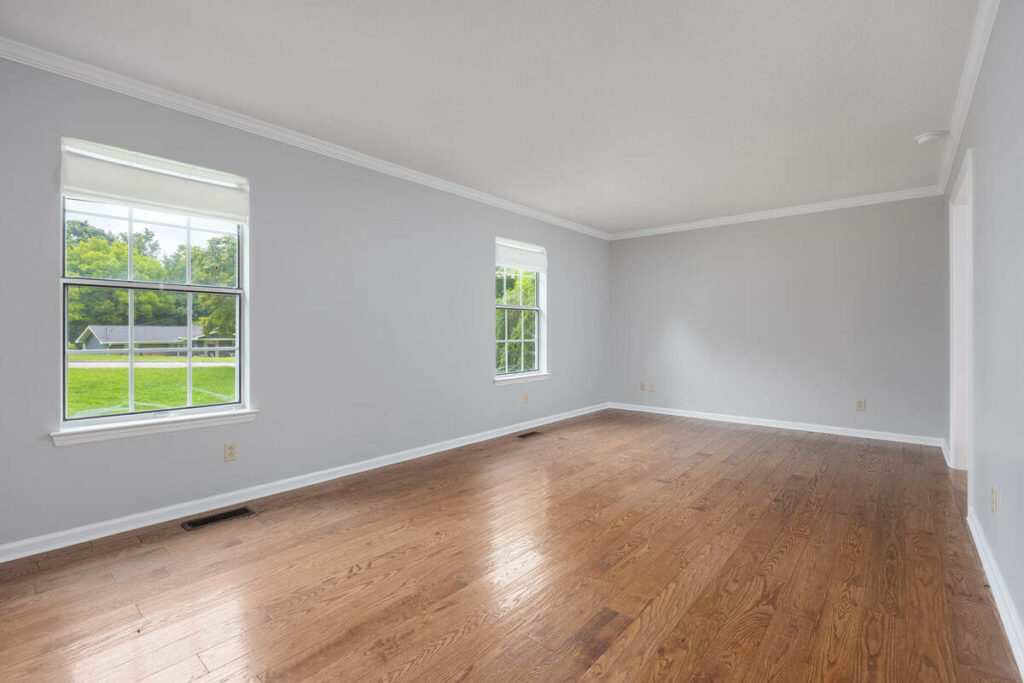 Empty living room before professional photo editing and virtual staging