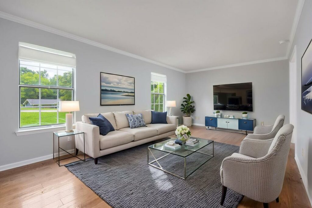 Professional photo editing and virtual staging of a modern living room