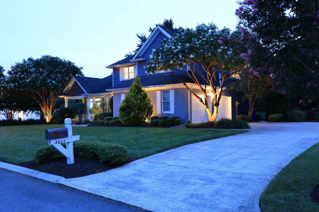 Professional photo editing before image of a residential property at dusk