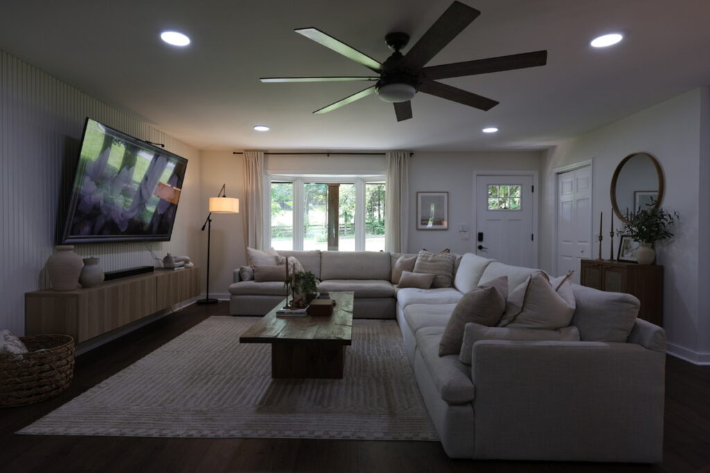 Living room before real estate photo editing services with dark, uneven exposure.