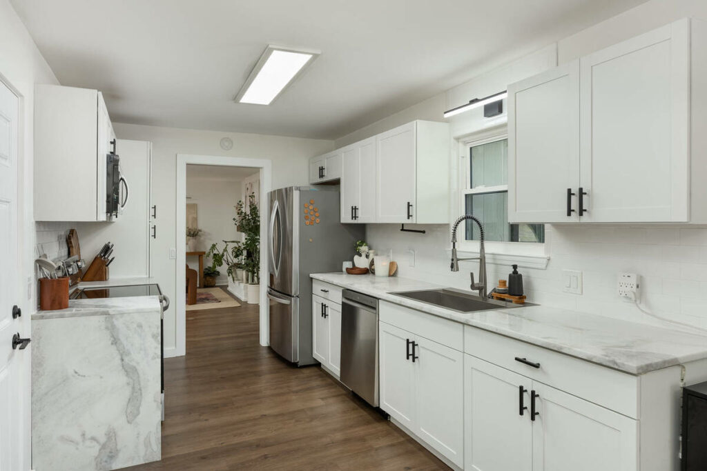 Modern kitchen enhanced with real estate photo editing services.