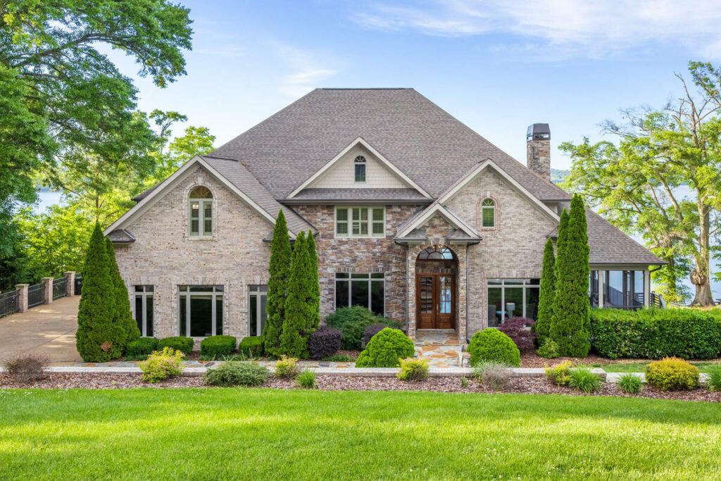 Home exterior with sky replacement using real estate photo editing services.