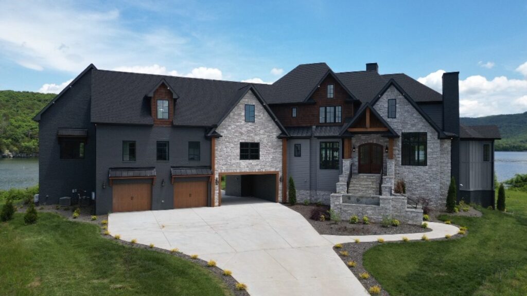 Luxury lakefront home before real estate photo editing services.