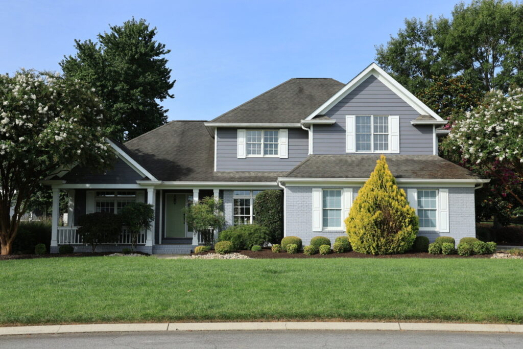 AI photo editing before enhancement of a gray house exterior