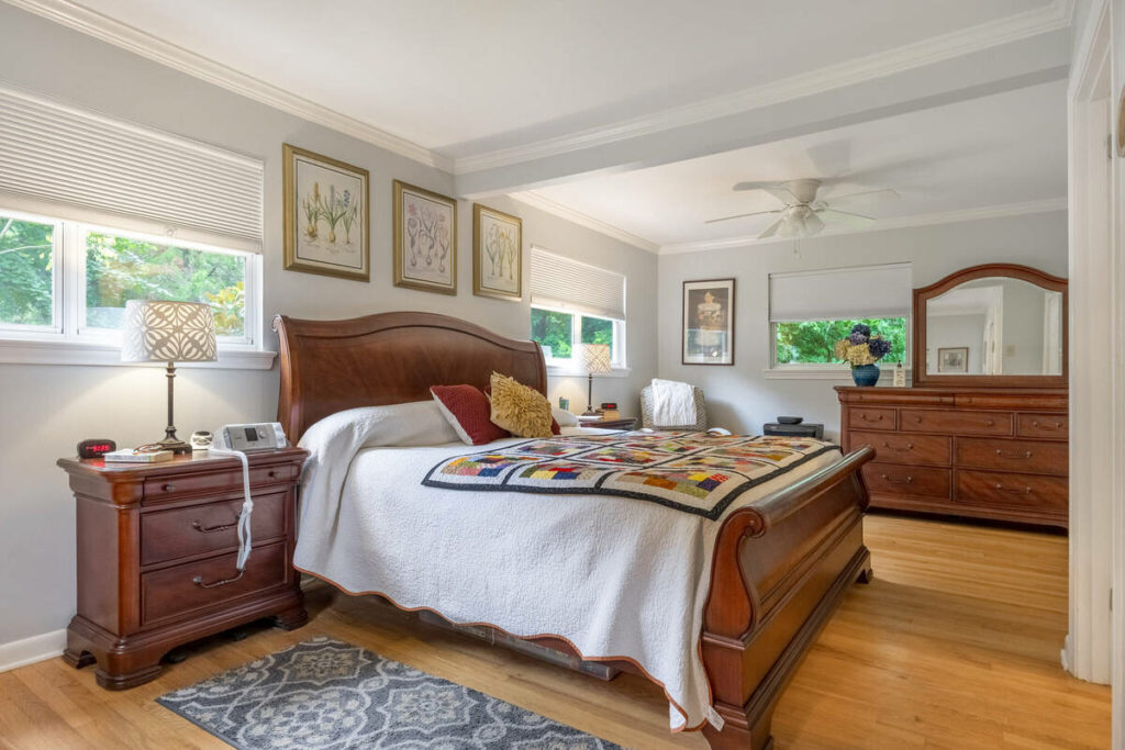 AI photo editing of a spacious bedroom with balanced natural lighting