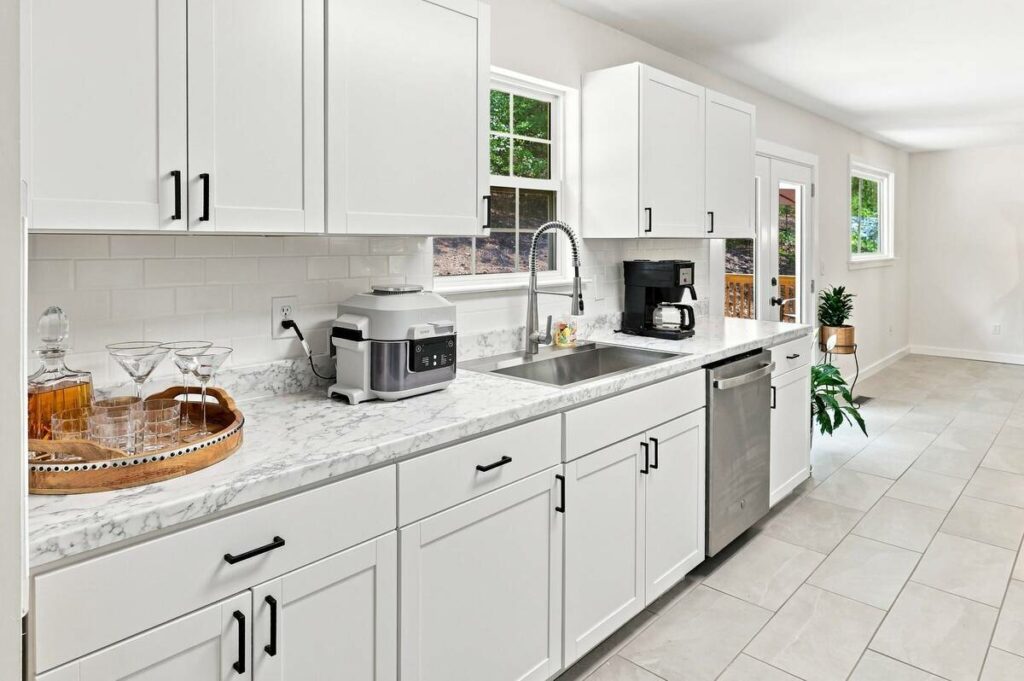 Kitchen before cord object removal in a real estate photo editing workflow