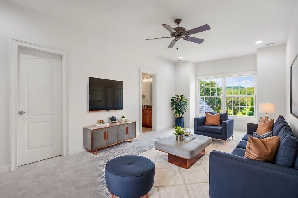 Modern living room with navy furniture added through AI virtual staging