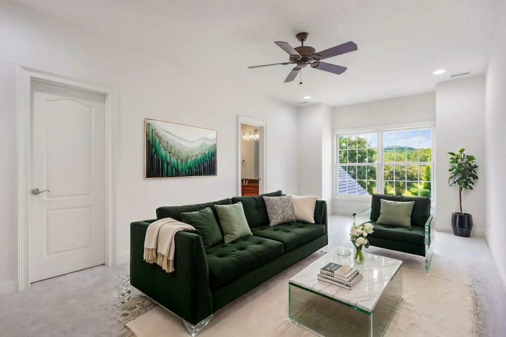 Green living room design created with AI real estate photo editor virtual staging