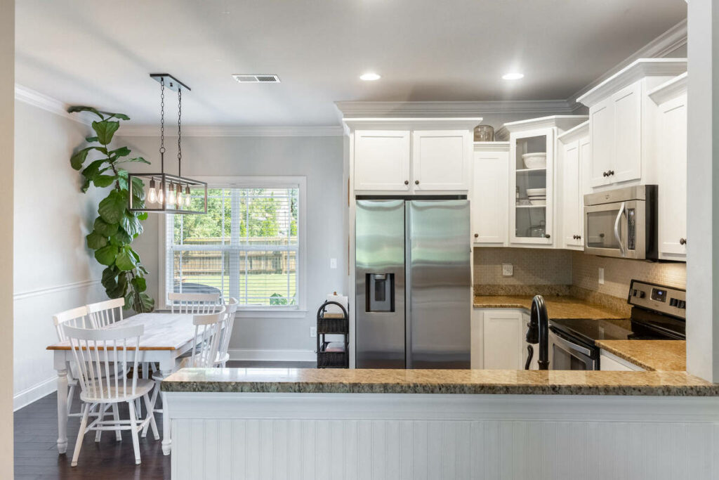 Kitchen and dining space enhanced with an AI real estate photo editor