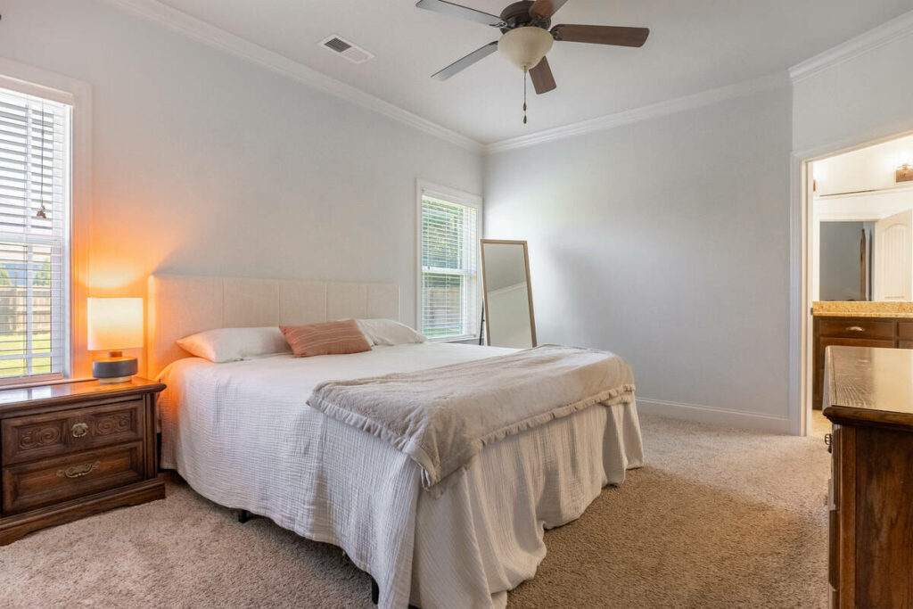 Bedroom photo enhanced with an AI real estate photo editor