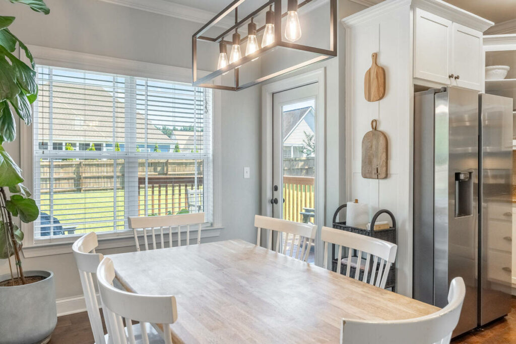 Bright dining area professionally enhanced with an AI real estate photo editor