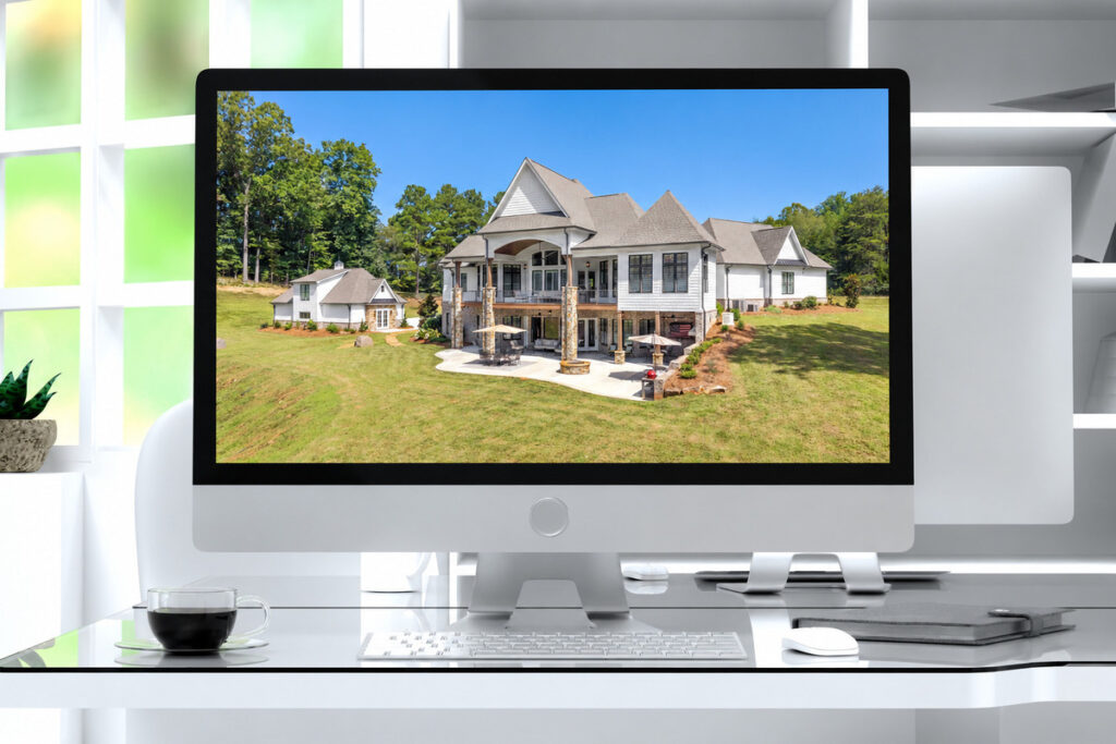Architecture photography of a luxury home displayed on a desktop computer screen.