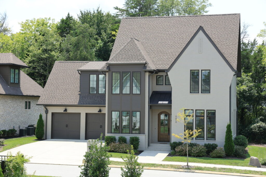 Architecture photography of a luxury home exterior before brightness and color adjustments.