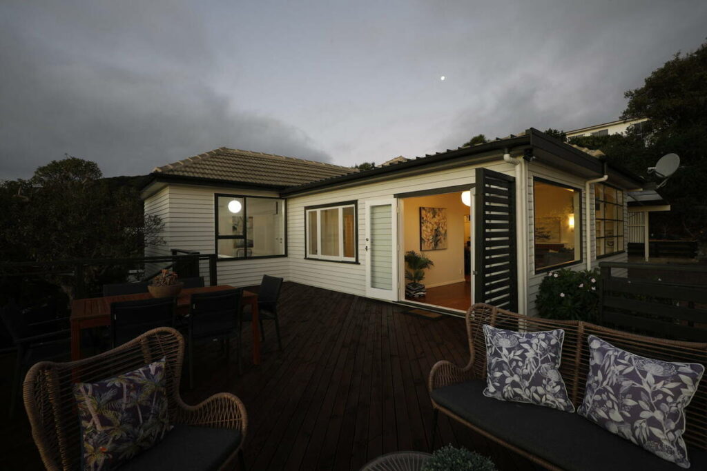 AutoHDR vs AI photo editing example of a dark exterior real estate photo before enhancement