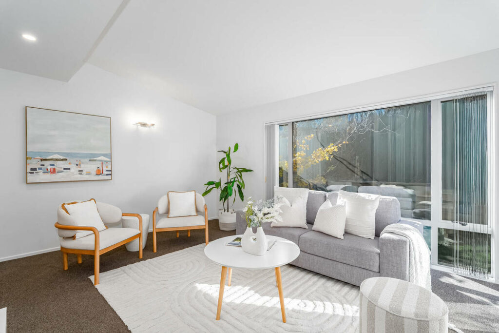 AutoHDR vs AI photo editing example of a bright living room with balanced window exposure
