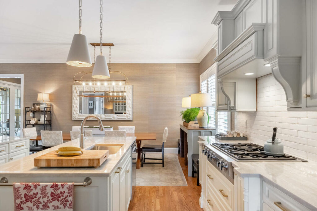 Lens distortion correction on a bright kitchen interior with straight cabinetry, counters, and vertical lines.