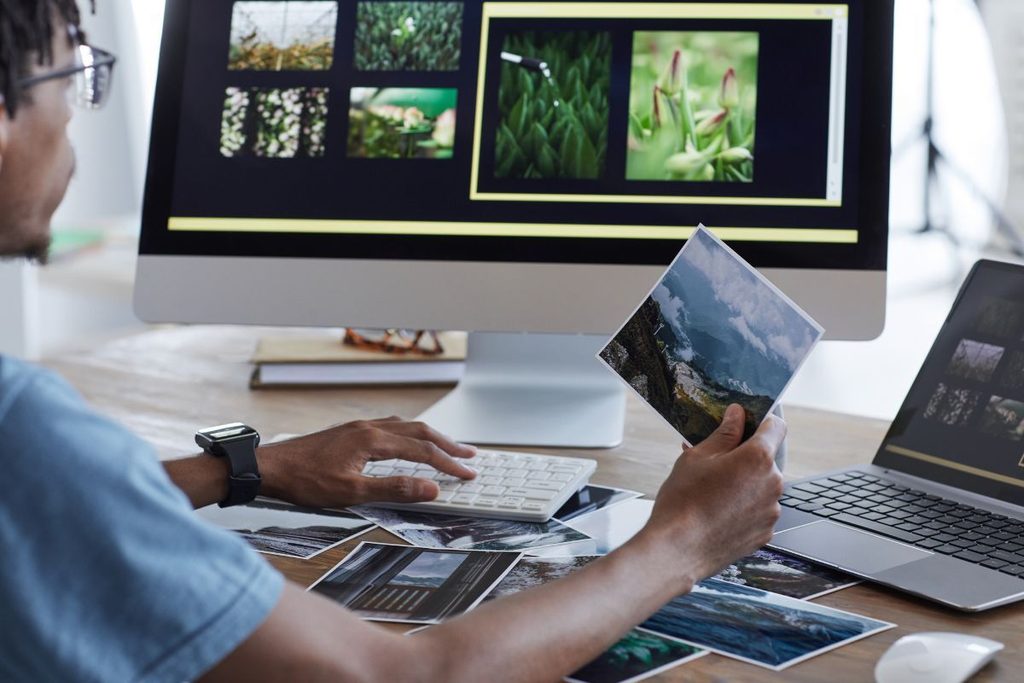 Photography coordinator managing images and photo editing workflow